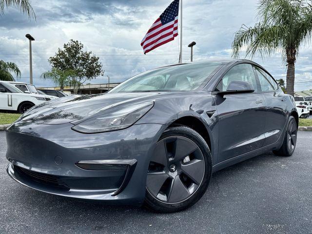 used 2023 Tesla Model 3 car, priced at $29,890