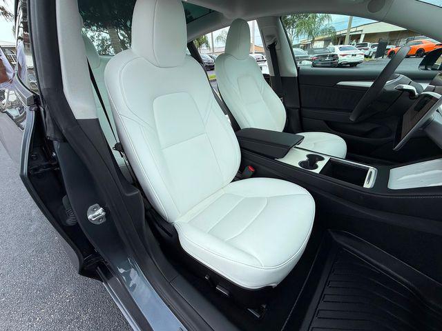 used 2023 Tesla Model 3 car, priced at $29,890