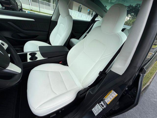 used 2023 Tesla Model 3 car, priced at $29,890