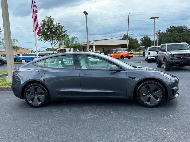 used 2023 Tesla Model 3 car, priced at $29,890