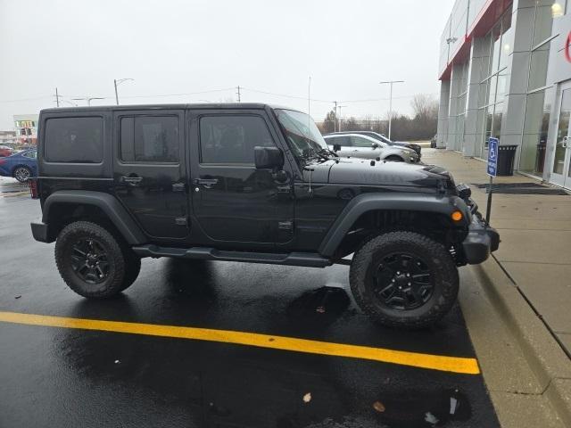 used 2016 Jeep Wrangler Unlimited car, priced at $19,623