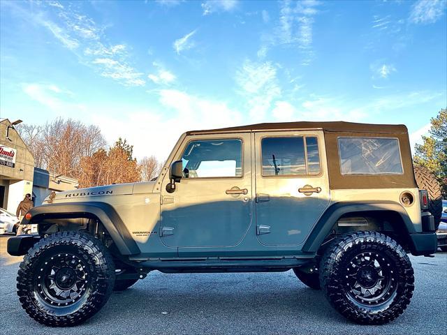 used 2015 Jeep Wrangler Unlimited car, priced at $24,789