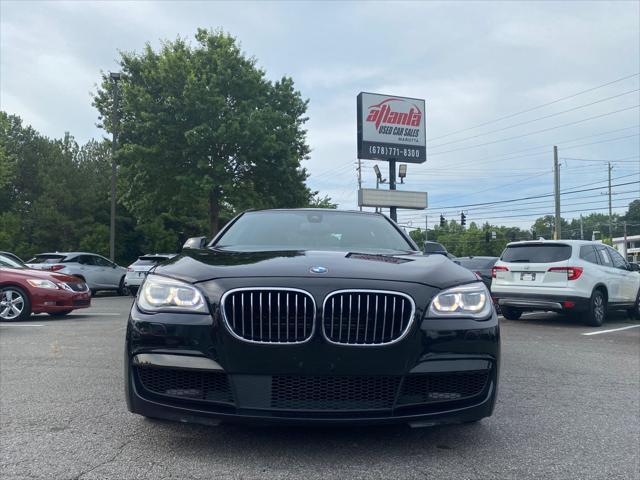 used 2014 BMW 750 car, priced at $16,898