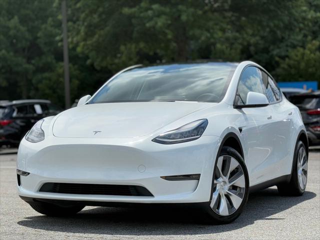 used 2023 Tesla Model Y car, priced at $30,876