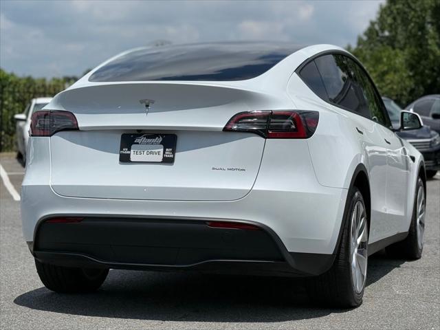 used 2023 Tesla Model Y car, priced at $30,876
