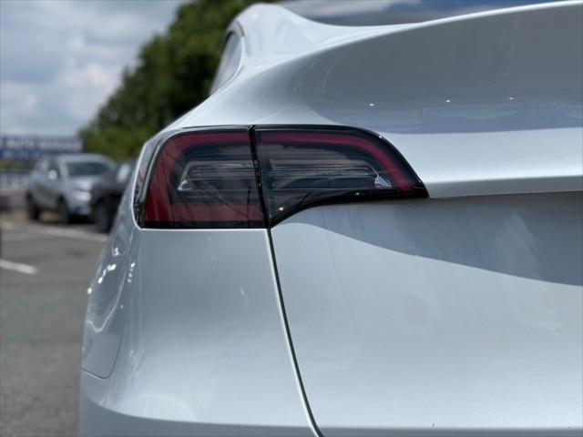 used 2023 Tesla Model Y car, priced at $30,876