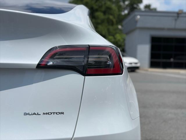 used 2023 Tesla Model Y car, priced at $30,876