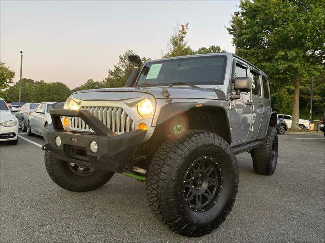 used 2017 Jeep Wrangler Unlimited car, priced at $33,698