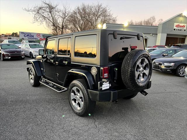 used 2018 Jeep Wrangler JK Unlimited car, priced at $26,999