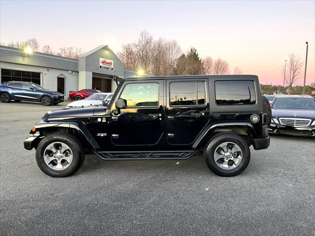 used 2018 Jeep Wrangler JK Unlimited car, priced at $24,679