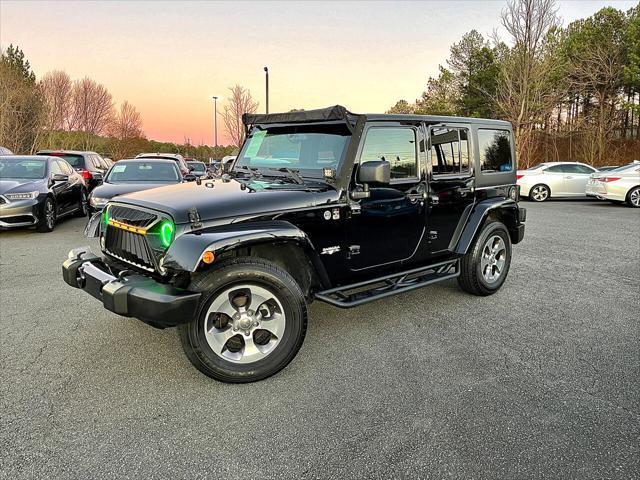 used 2018 Jeep Wrangler JK Unlimited car, priced at $26,799