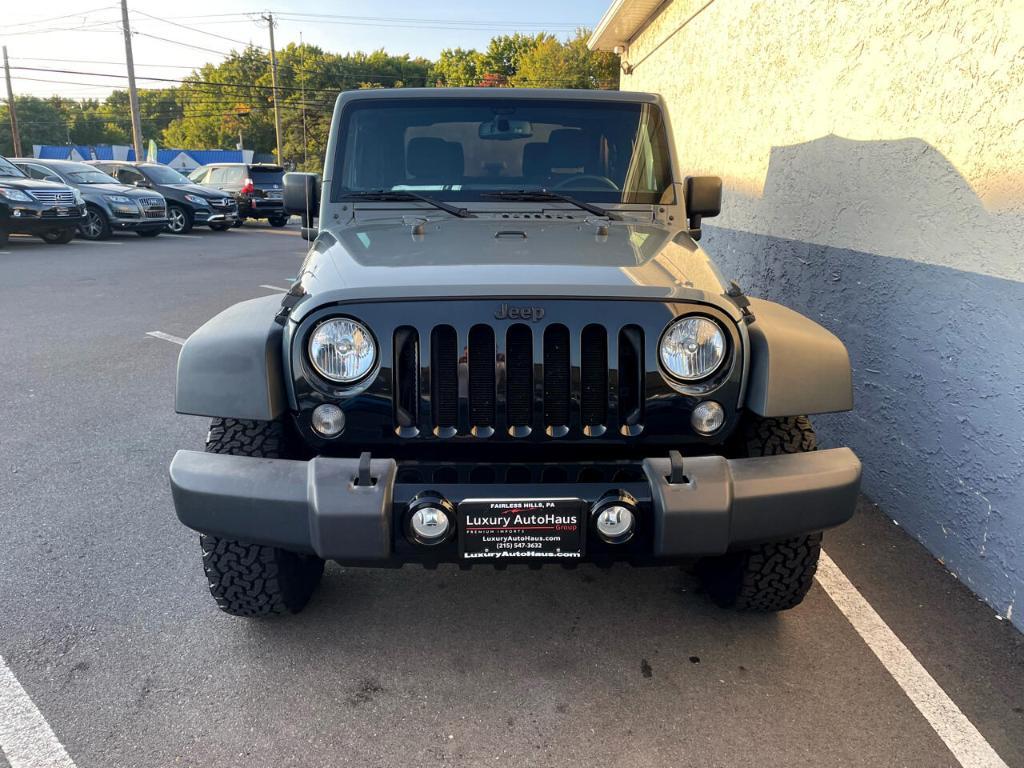 used 2015 Jeep Wrangler car, priced at $13,990