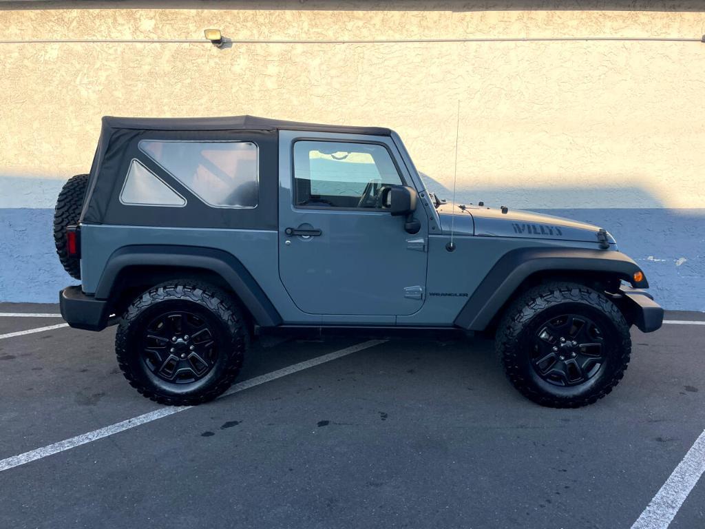 used 2015 Jeep Wrangler car, priced at $13,990