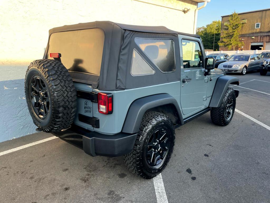 used 2015 Jeep Wrangler car, priced at $13,990