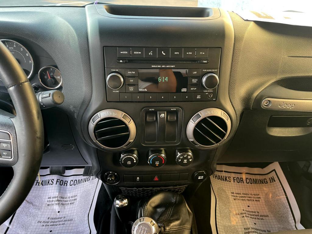 used 2015 Jeep Wrangler car, priced at $13,990