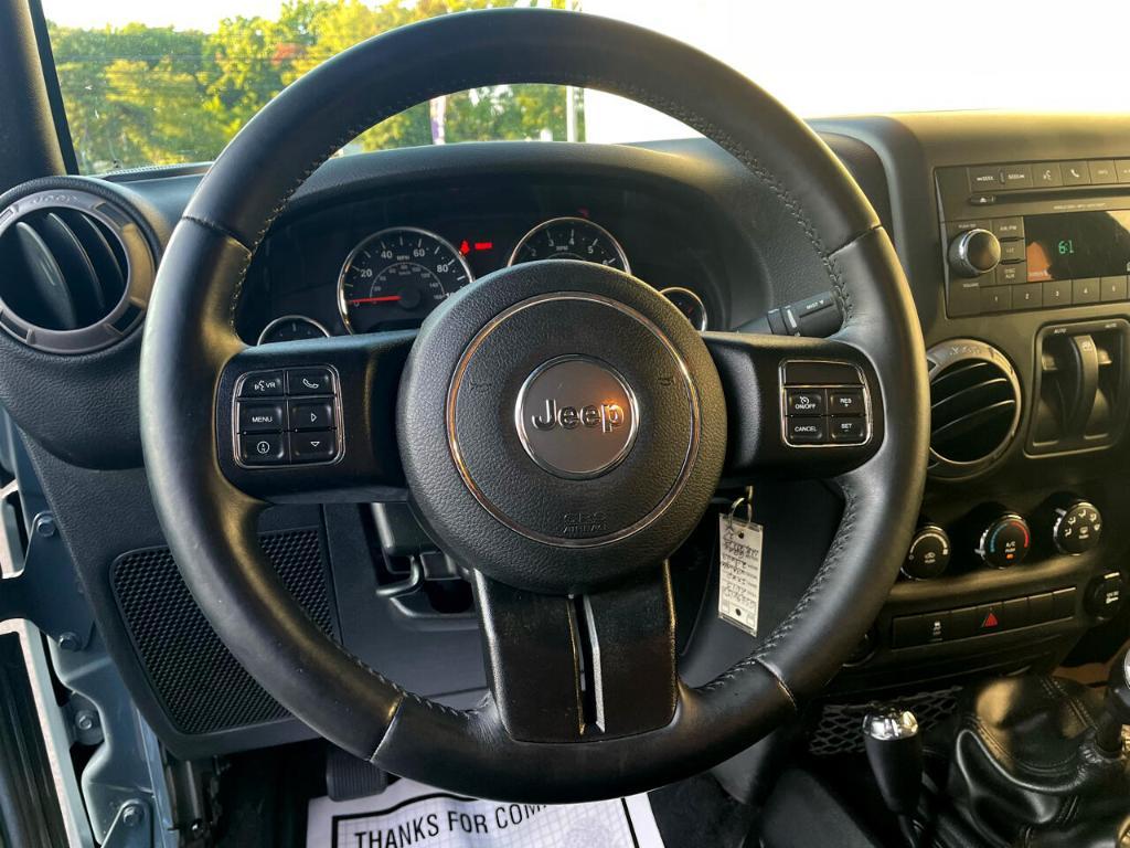 used 2015 Jeep Wrangler car, priced at $13,990