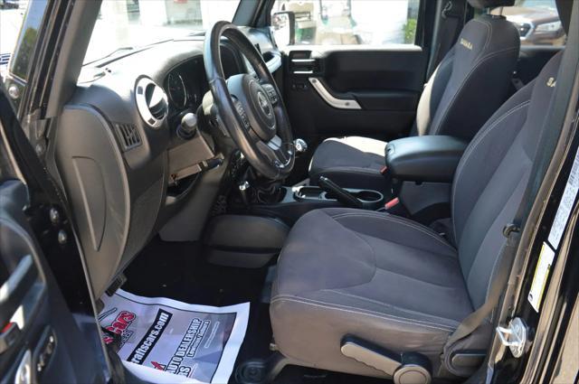 used 2015 Jeep Wrangler Unlimited car, priced at $19,990