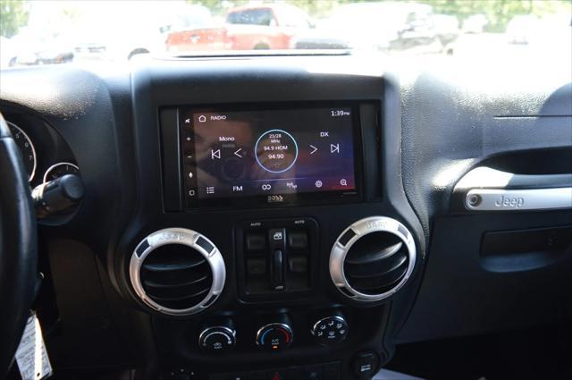 used 2015 Jeep Wrangler Unlimited car, priced at $19,990