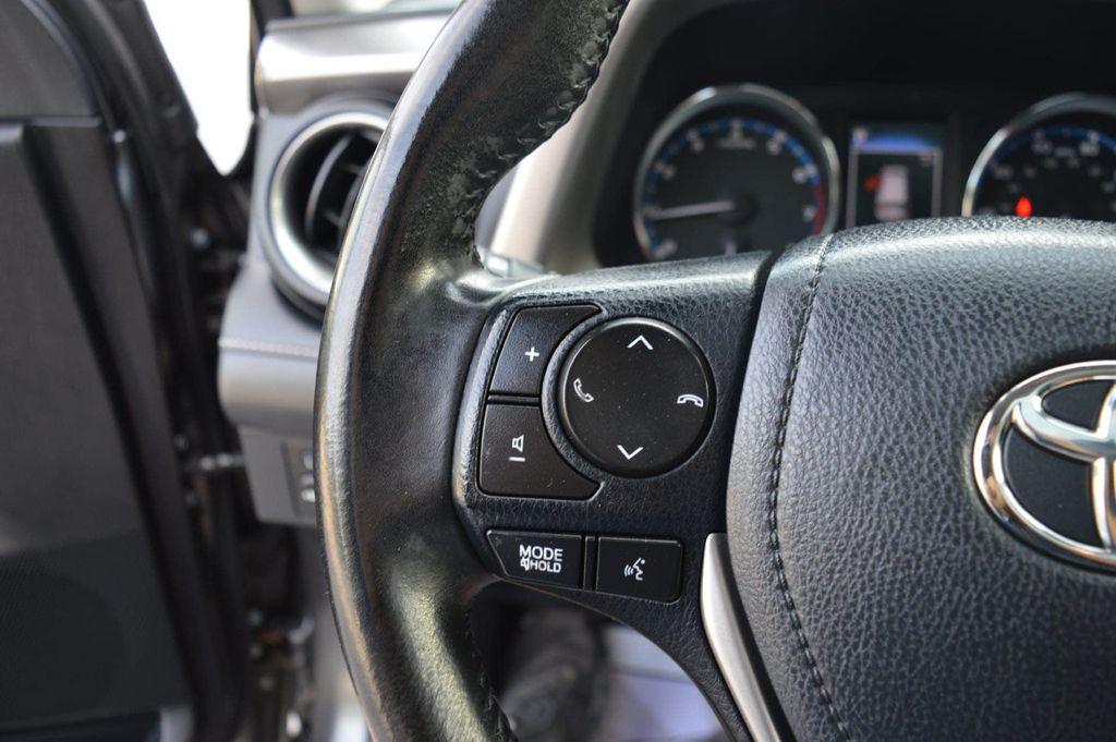 used 2018 Toyota RAV4 car, priced at $20,990