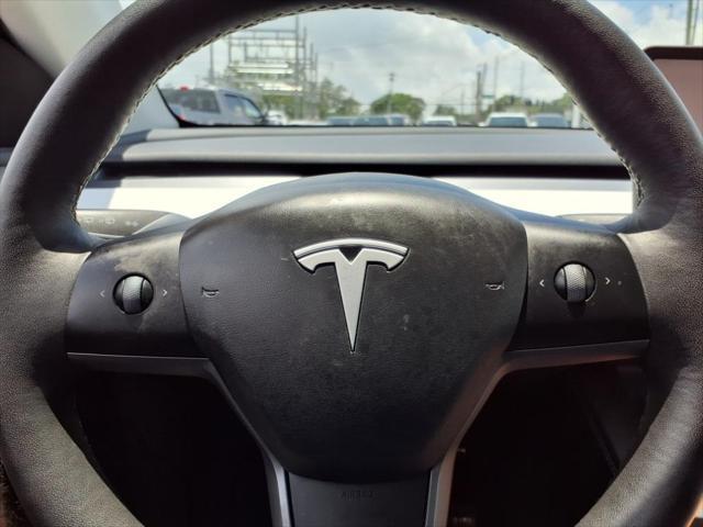 used 2024 Tesla Model Y car, priced at $29,497
