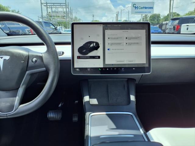 used 2024 Tesla Model Y car, priced at $29,497