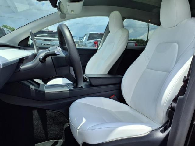 used 2024 Tesla Model Y car, priced at $29,497