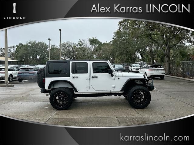 used 2014 Jeep Wrangler Unlimited car, priced at $16,995