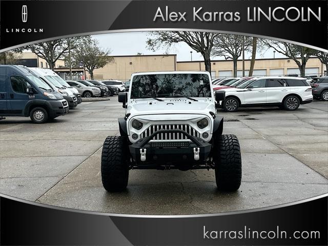 used 2014 Jeep Wrangler Unlimited car, priced at $16,995