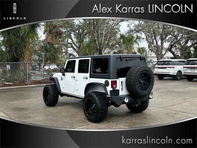 used 2014 Jeep Wrangler Unlimited car, priced at $16,995