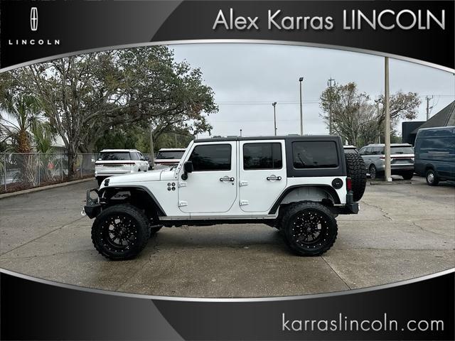 used 2014 Jeep Wrangler Unlimited car, priced at $16,995