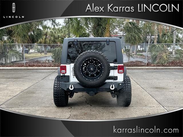 used 2014 Jeep Wrangler Unlimited car, priced at $16,995