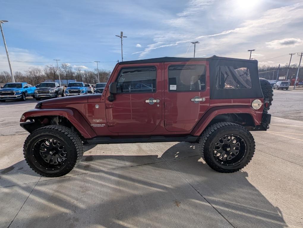 used 2012 Jeep Wrangler Unlimited car, priced at $16,991