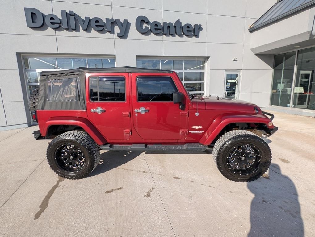 used 2012 Jeep Wrangler Unlimited car, priced at $16,991