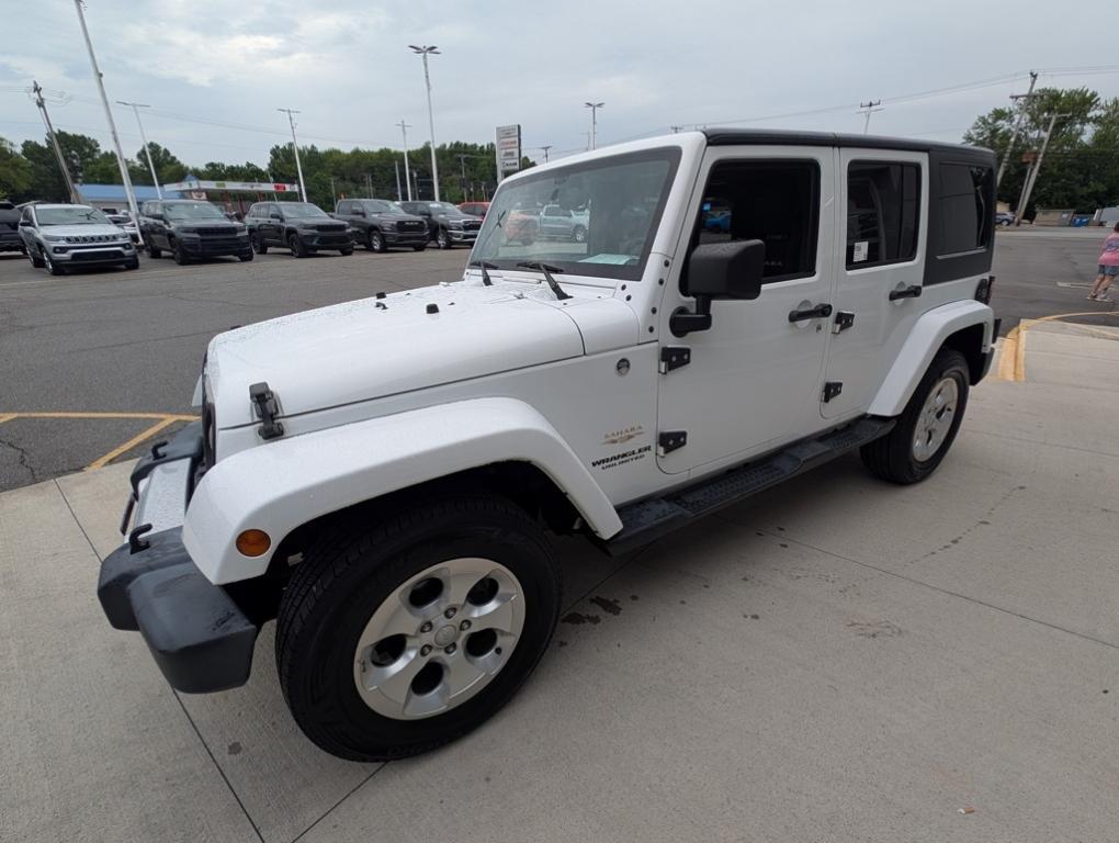 used 2015 Jeep Wrangler Unlimited car, priced at $19,991