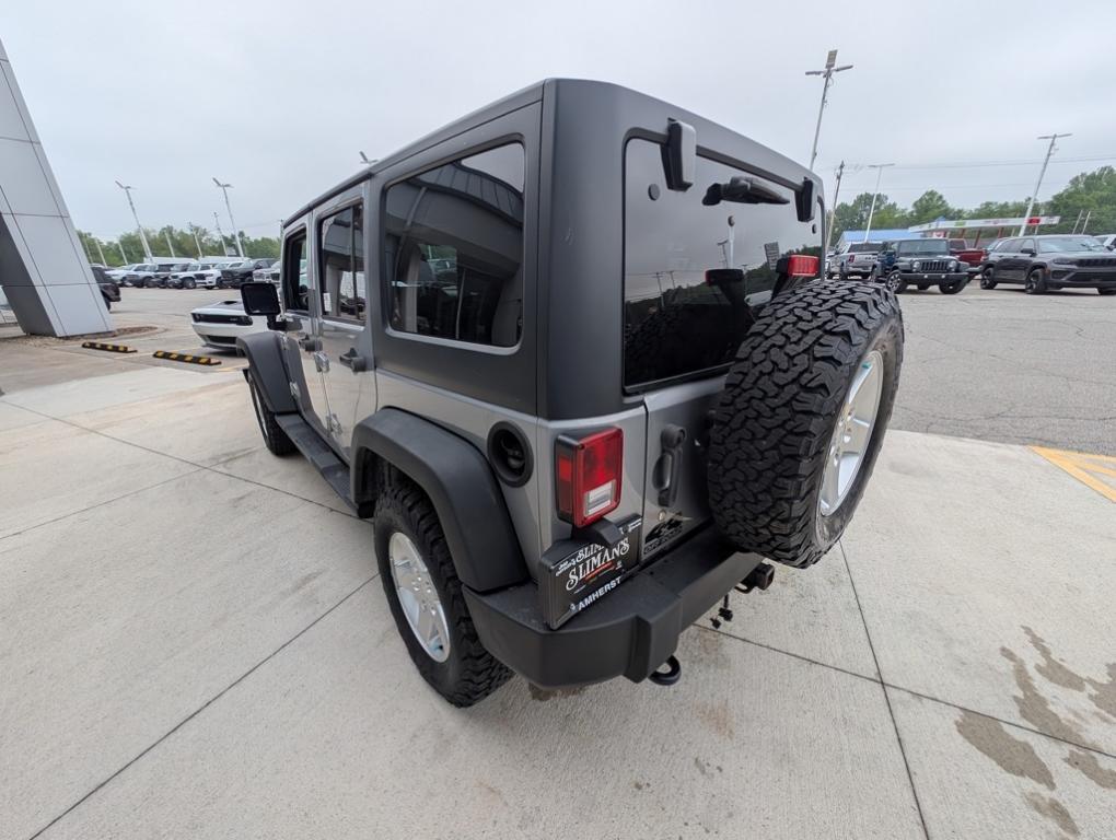 used 2014 Jeep Wrangler Unlimited car, priced at $17,991