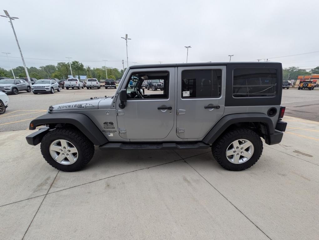 used 2014 Jeep Wrangler Unlimited car, priced at $17,991