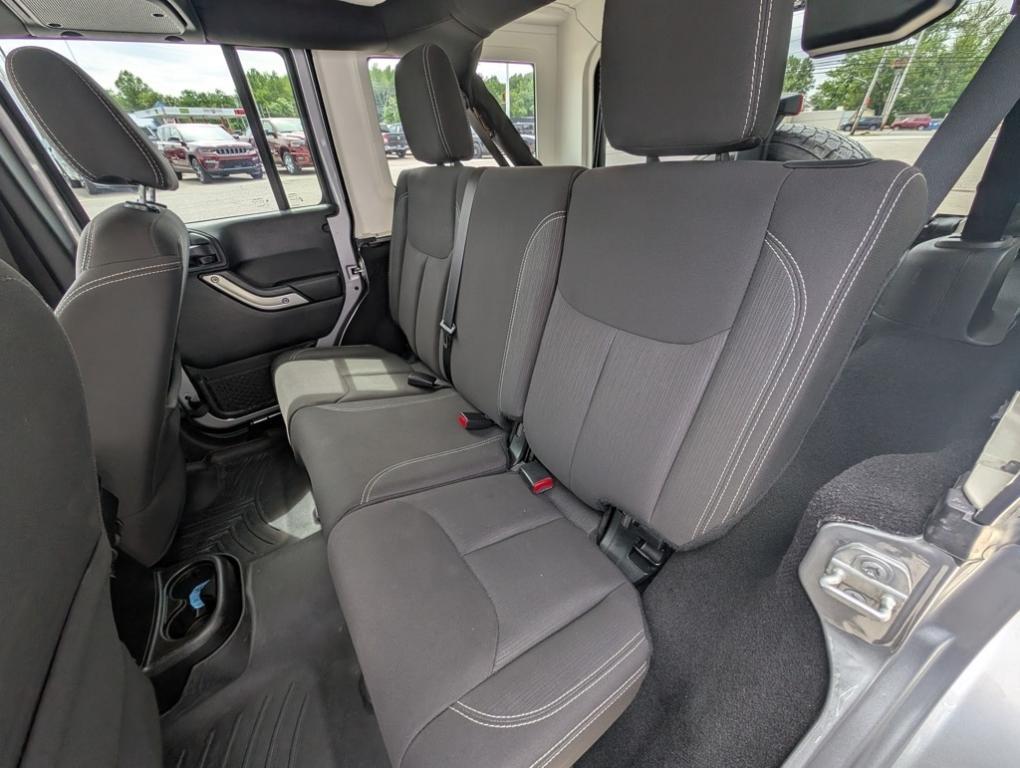 used 2018 Jeep Wrangler JK Unlimited car, priced at $23,500