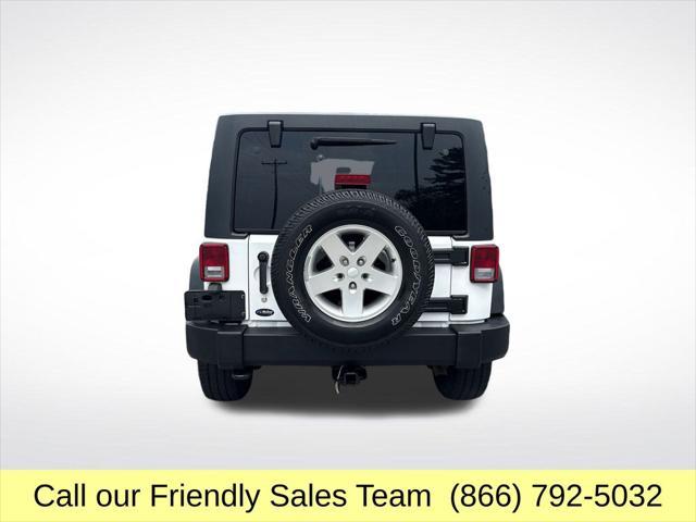 used 2011 Jeep Wrangler Unlimited car, priced at $11,439