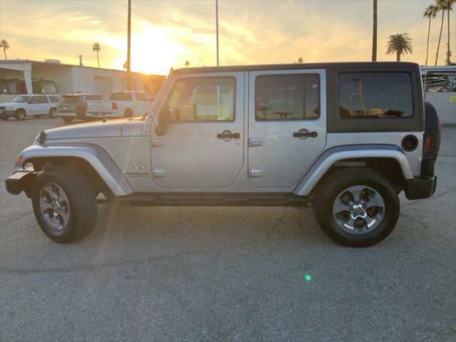 used 2016 Jeep Wrangler Unlimited car, priced at $19,157