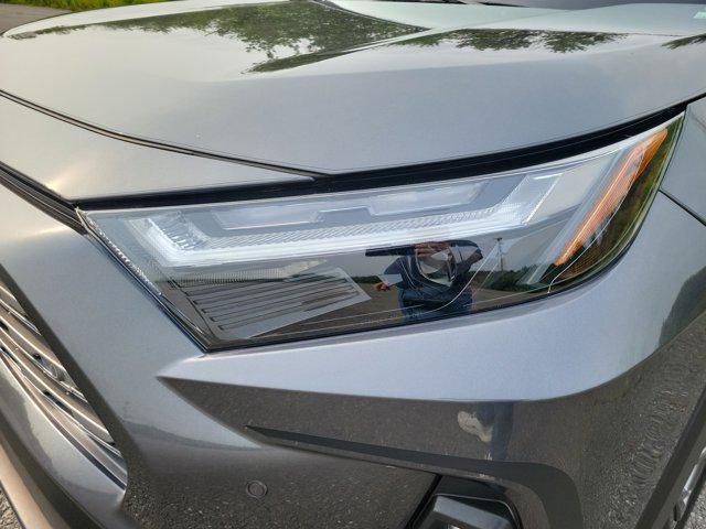 used 2023 Toyota RAV4 Hybrid car, priced at $33,880