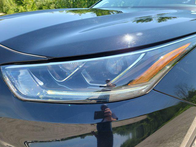used 2021 Toyota Highlander Hybrid car, priced at $40,136