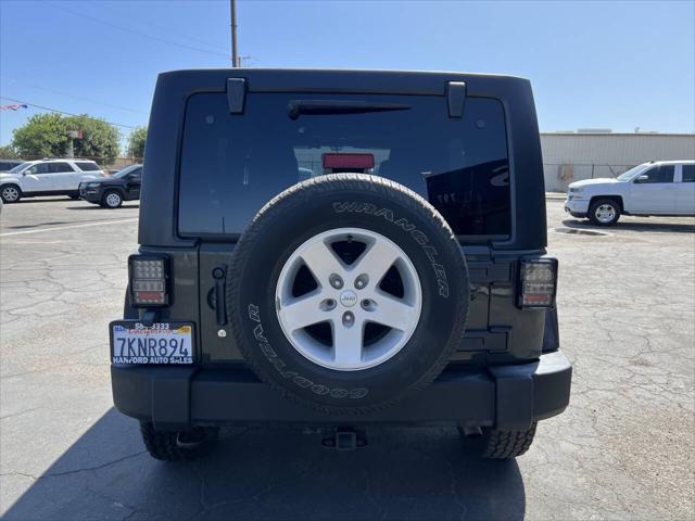 used 2015 Jeep Wrangler Unlimited car, priced at $18,999