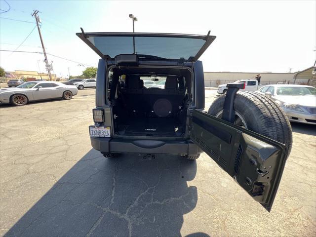 used 2015 Jeep Wrangler Unlimited car, priced at $18,999