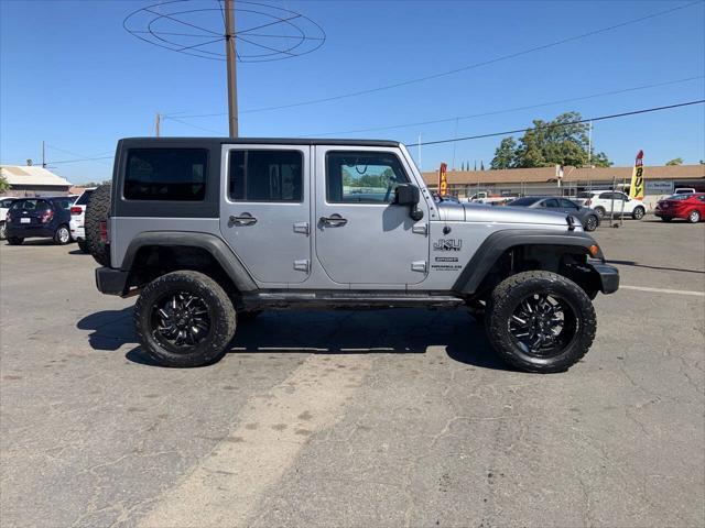 used 2015 Jeep Wrangler Unlimited car, priced at $15,950