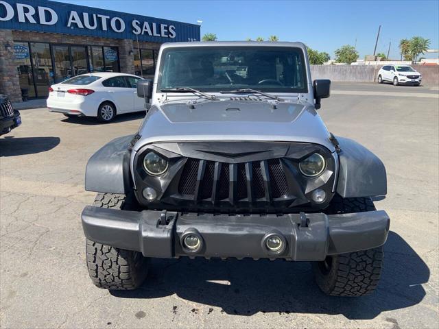 used 2015 Jeep Wrangler Unlimited car, priced at $15,950