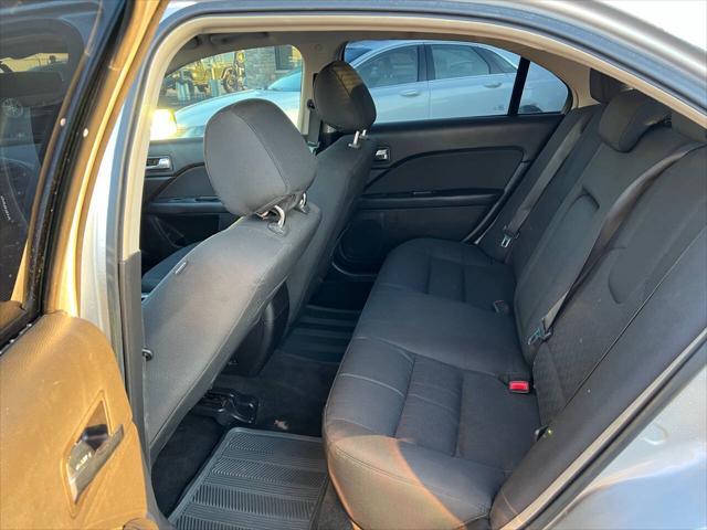 used 2012 Ford Fusion car, priced at $7,599