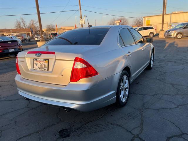 used 2012 Ford Fusion car, priced at $7,599