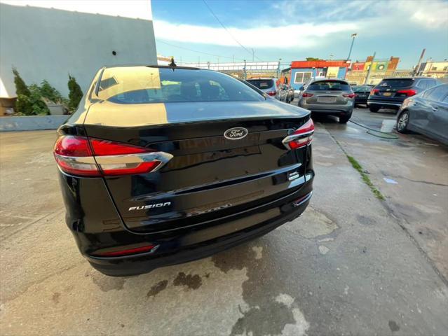 used 2019 Ford Fusion car, priced at $16,999