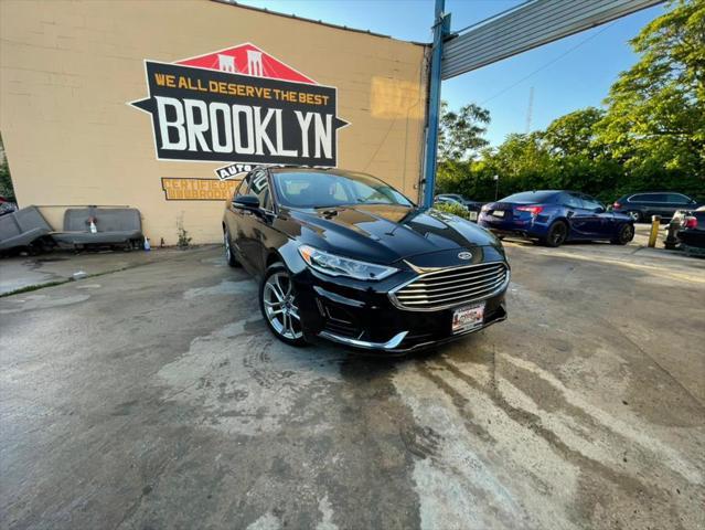 used 2019 Ford Fusion car, priced at $16,999