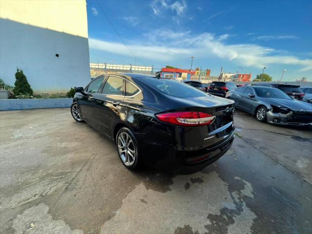 used 2019 Ford Fusion car, priced at $16,999